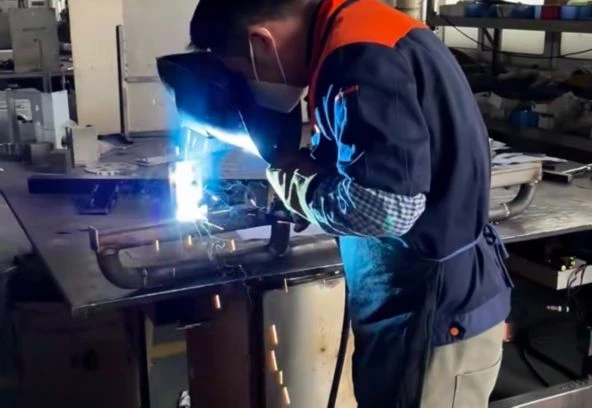 Workers Welding with Arc Light